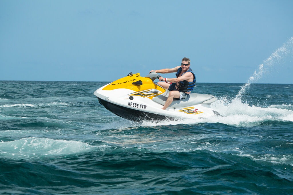 Tourist enjoying a jet ski experience in Nassau Bahamas