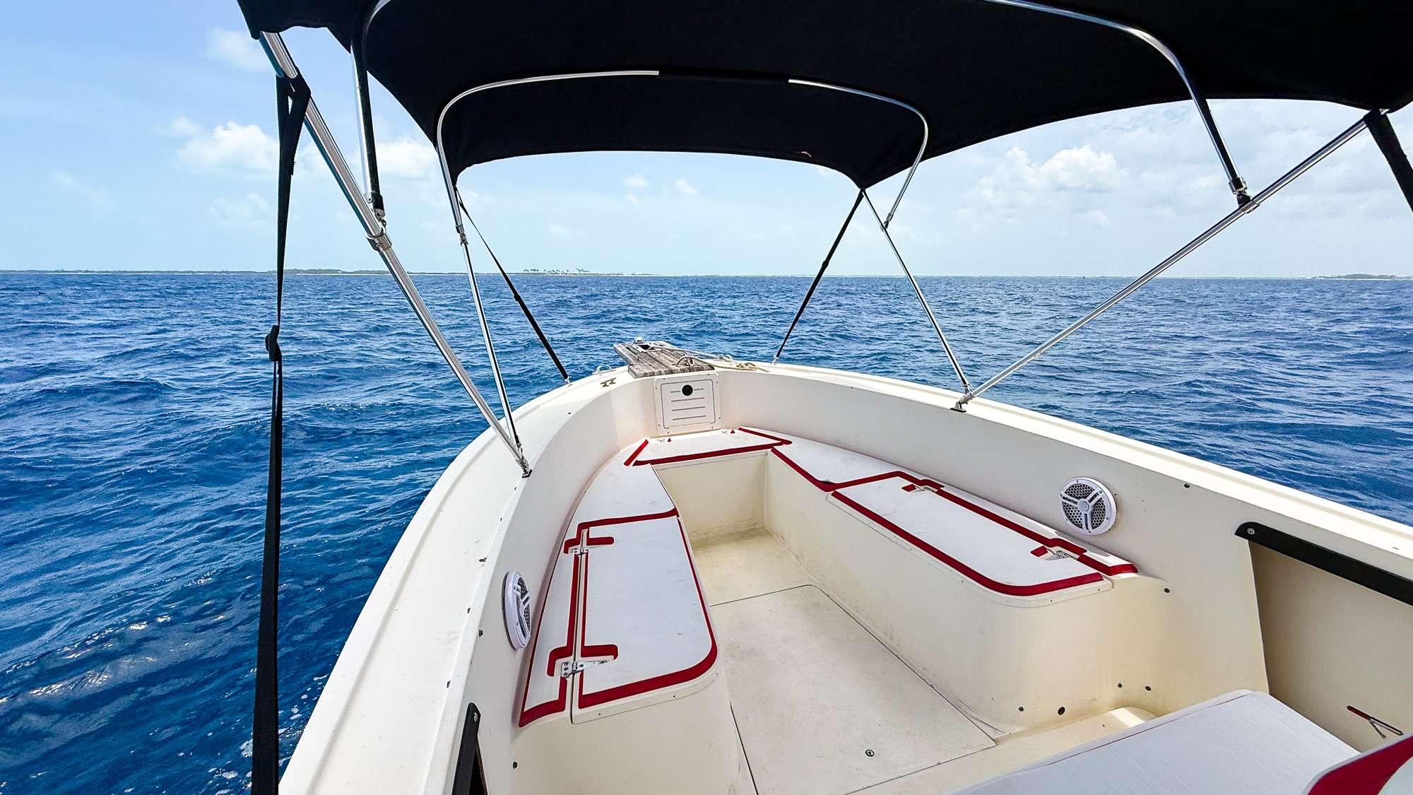 Forward seating aboard Forever the Co during a private boat charter in Nassau, Bahamas. Console