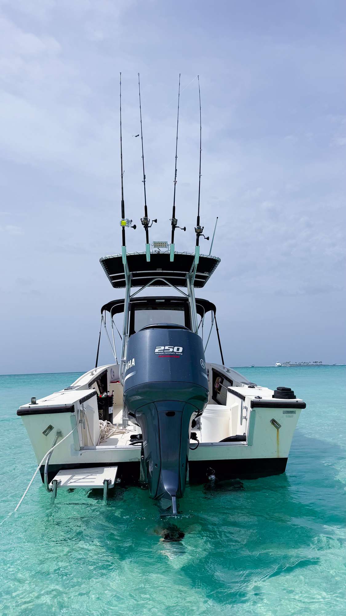 Rear view of Forever the Co powered by a Yamaha F250 during a private Nassau boat charter.